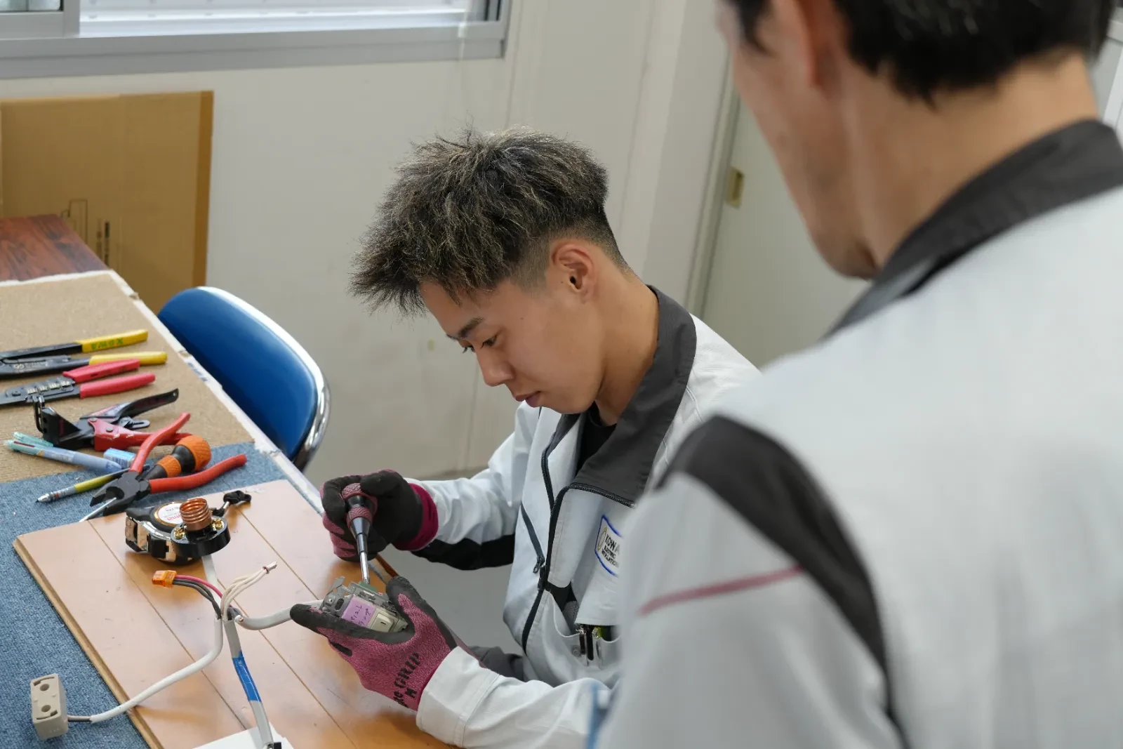 先輩の指導・現場の写真
